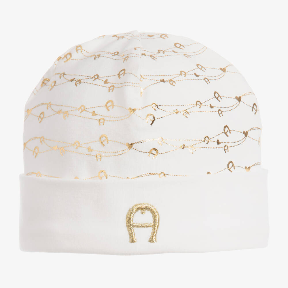 AIGNER - Кремовая шапочка из хлопка пима с золотистым узором | Childrensalon