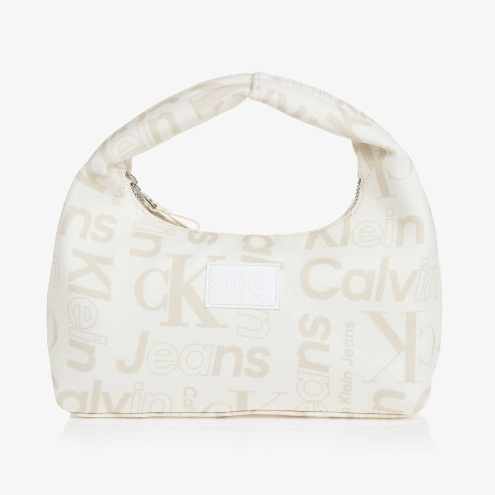 Calvin Klein - حقيبة يد بطبعة مونوغرام لون بيج للبنات | Childrensalon