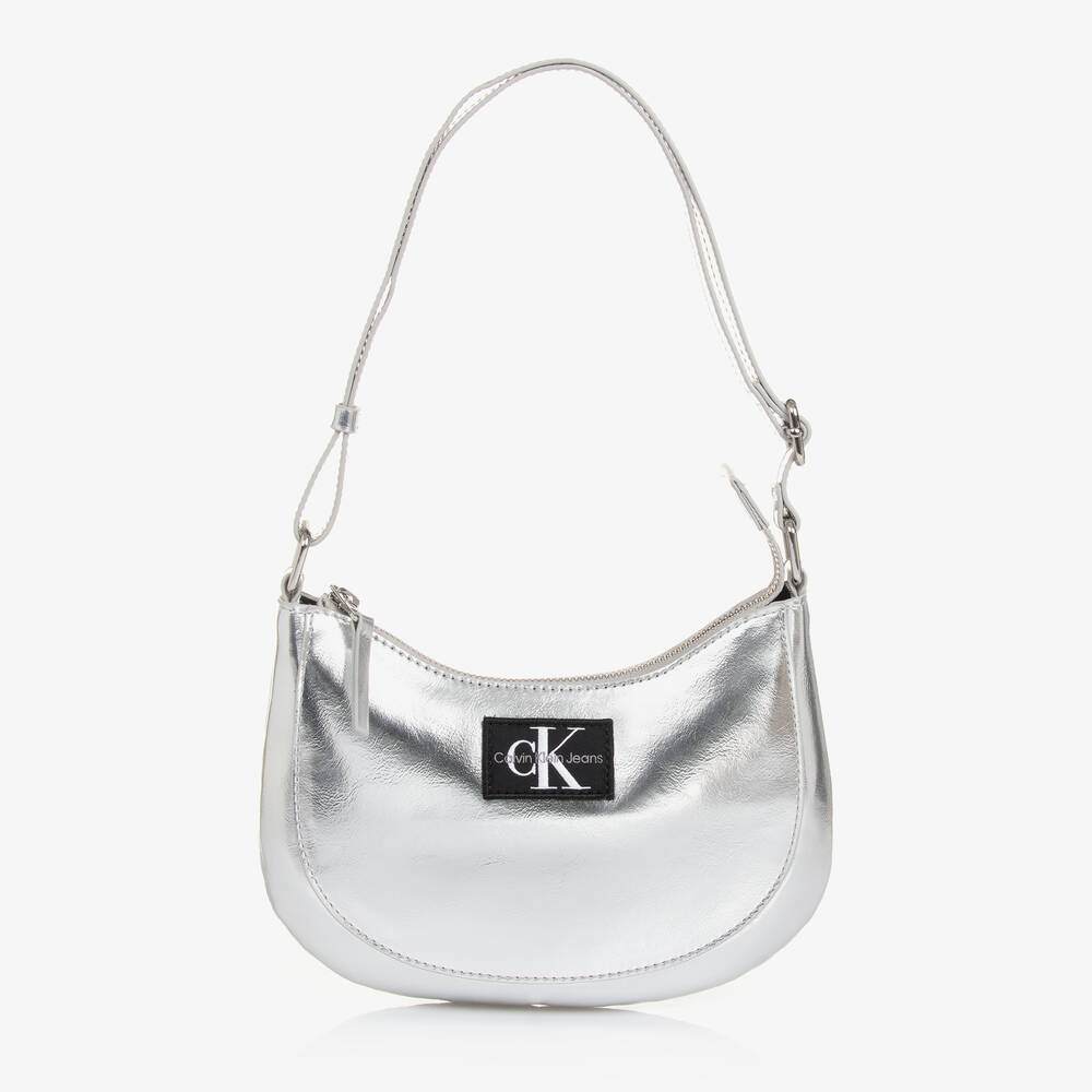 Calvin Klein - حقيبة كتف جلد صناعي لون فضّي ميتاليك (15 سم) | Childrensalon