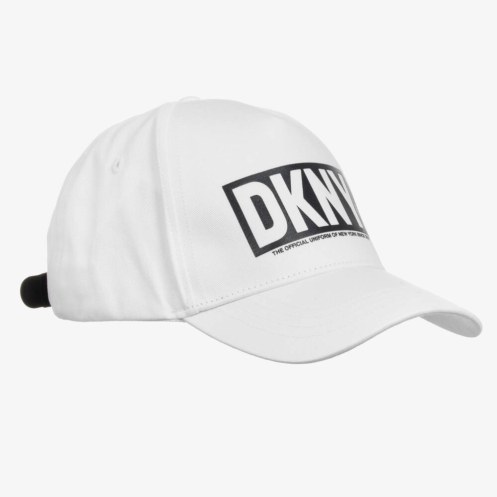 DKNY - كاب قطن تويل لون أبيض تينز | Childrensalon