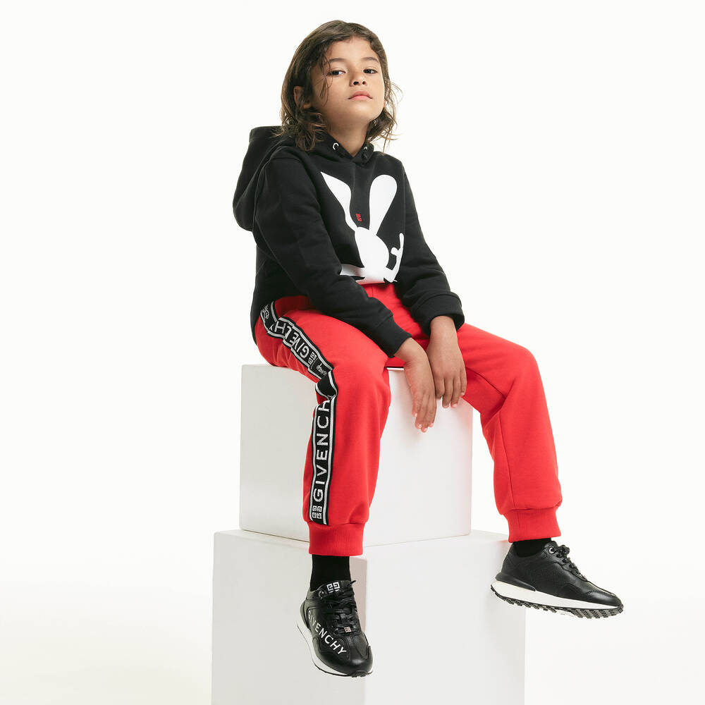 Logo cotton-blend jersey track pants in black - Givenchy Kids