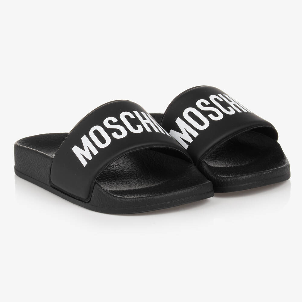 Shop Moschino Kid-teen Black & White Sliders