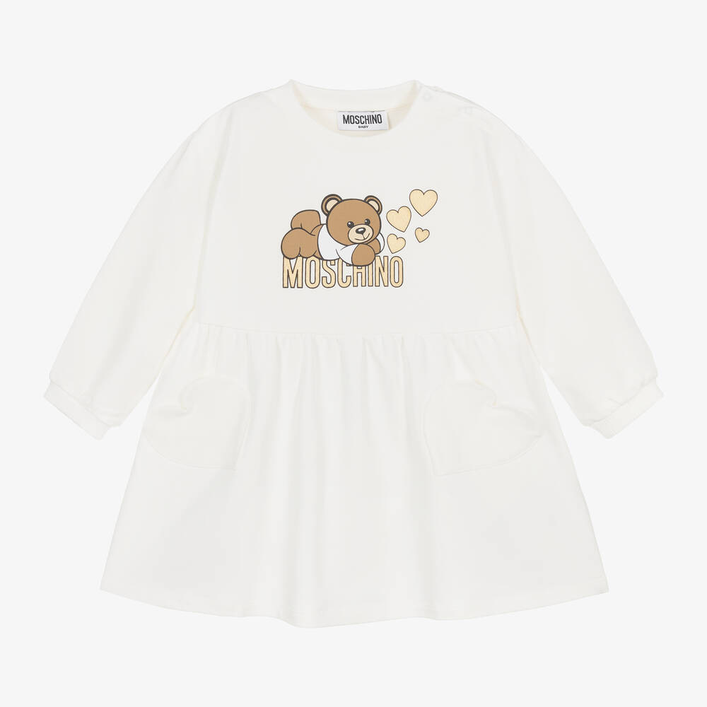 Moschino Baby - Girls Ivory Cotton Teddy Bear Logo Dress | Childrensalon