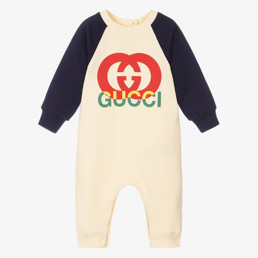 Gucci-أوفرول رومبر قطن لون كحلي وعاجي للمواليد | Childrensalon