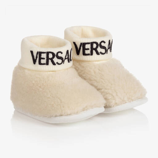 Versace-Ivory Sheepskin Logo Booties | Childrensalon