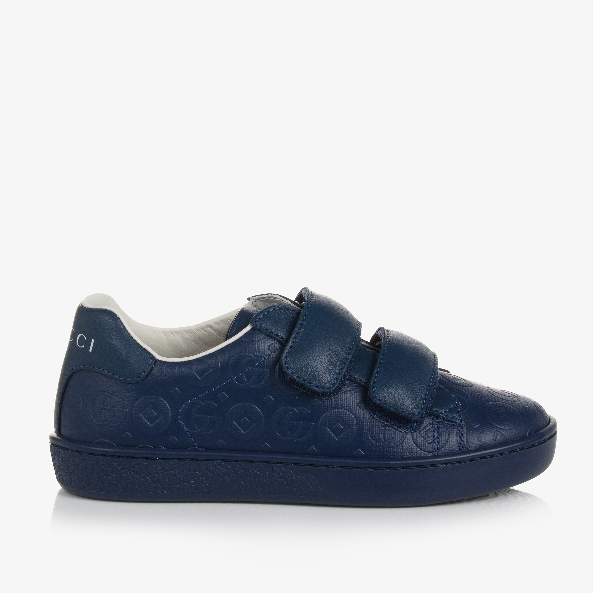 Gucci store navy trainers